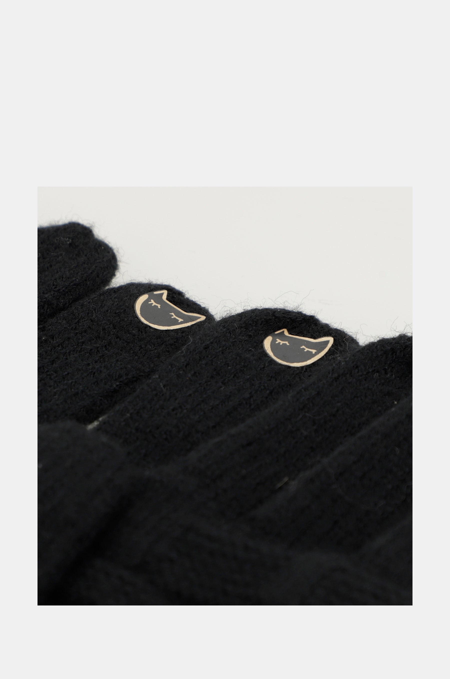 Black knit gloves