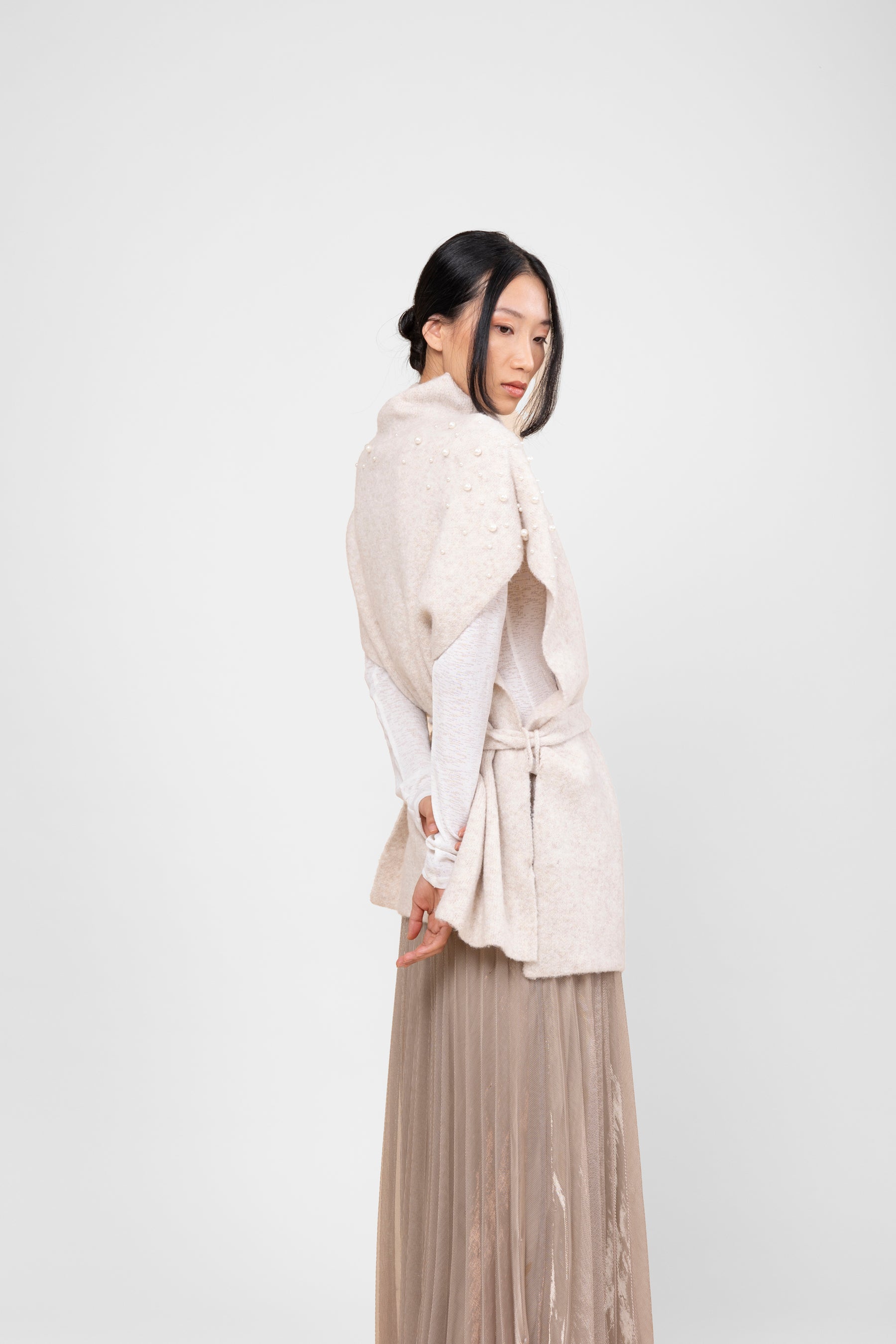 Off-white turtleneck poncho with belt