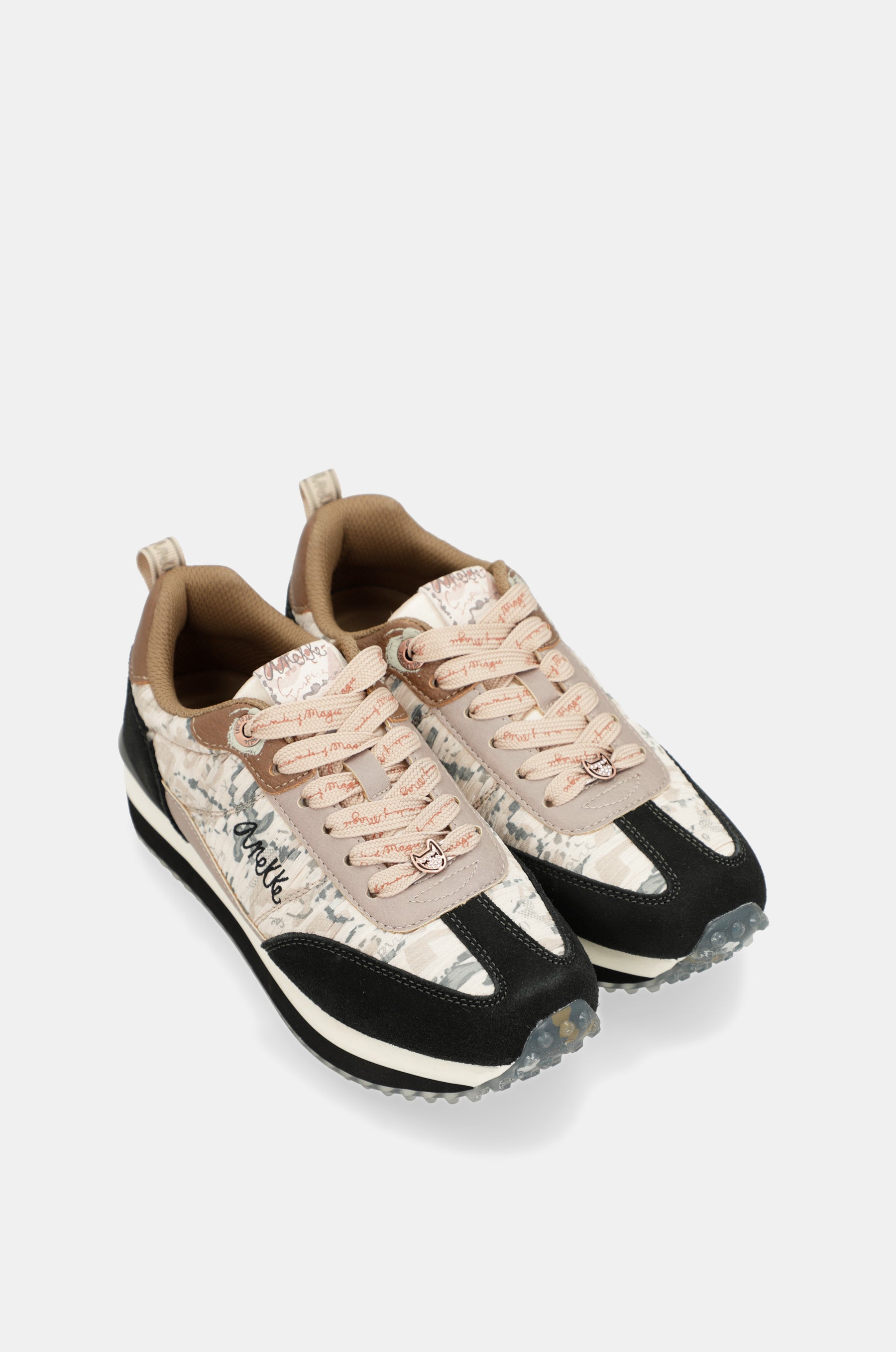 Black & gold sneakers with multicoloured sole
