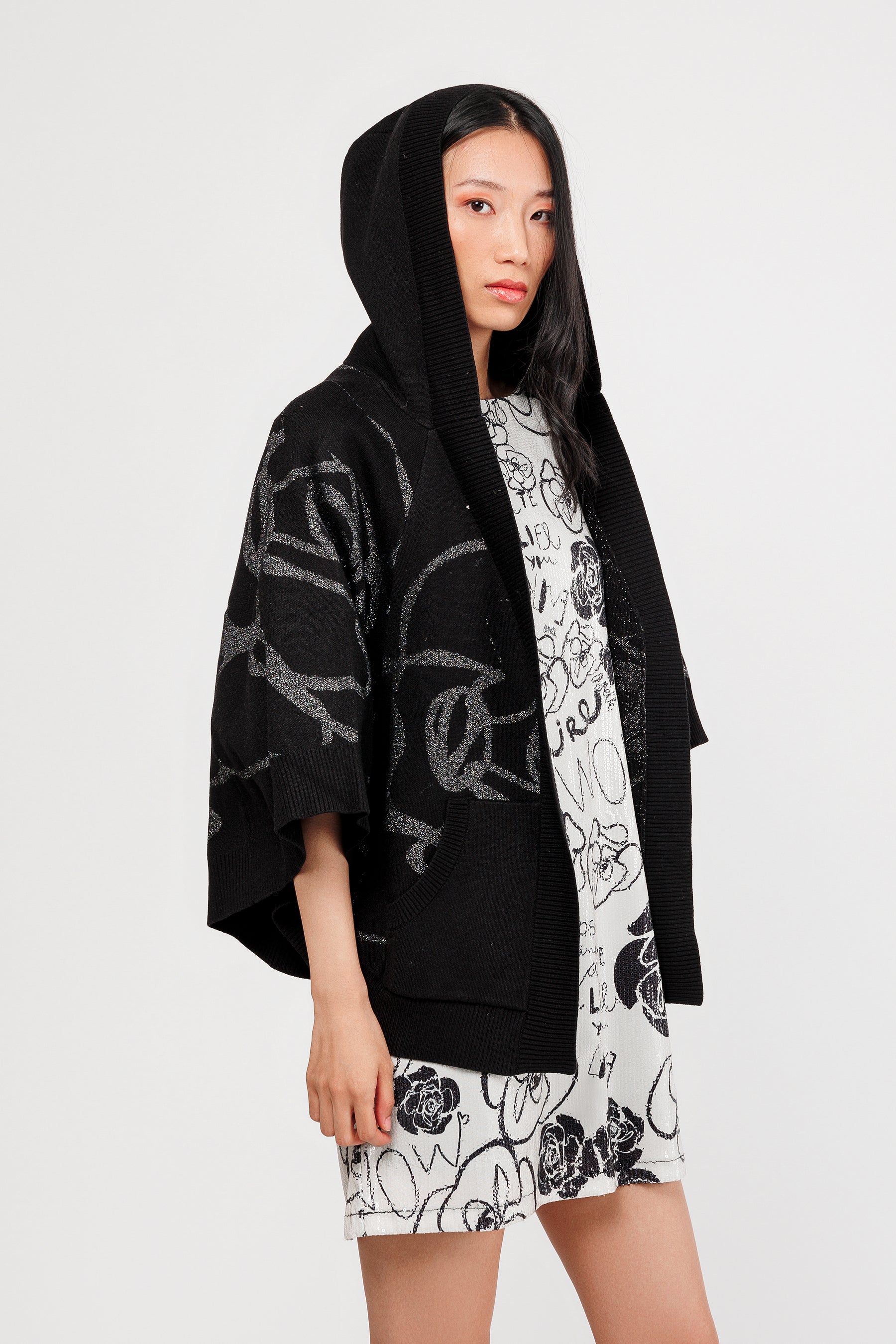 Black poncho-style jacket