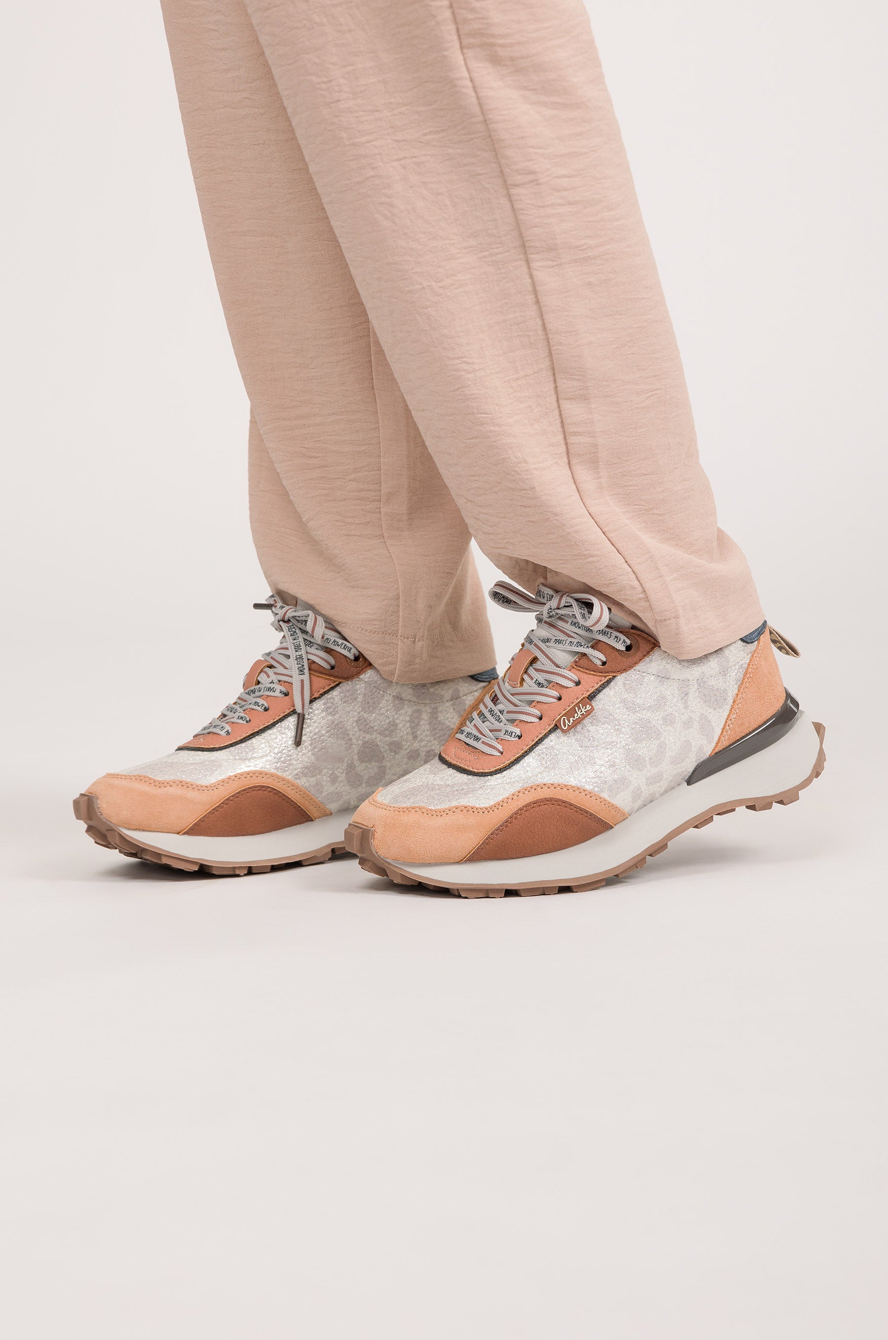 Beige and orange sneakers
