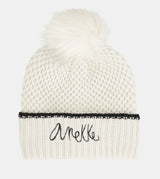 Beige knitted beanie with pompom