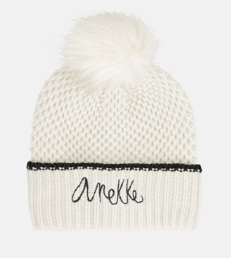 Beige knitted beanie with pompom