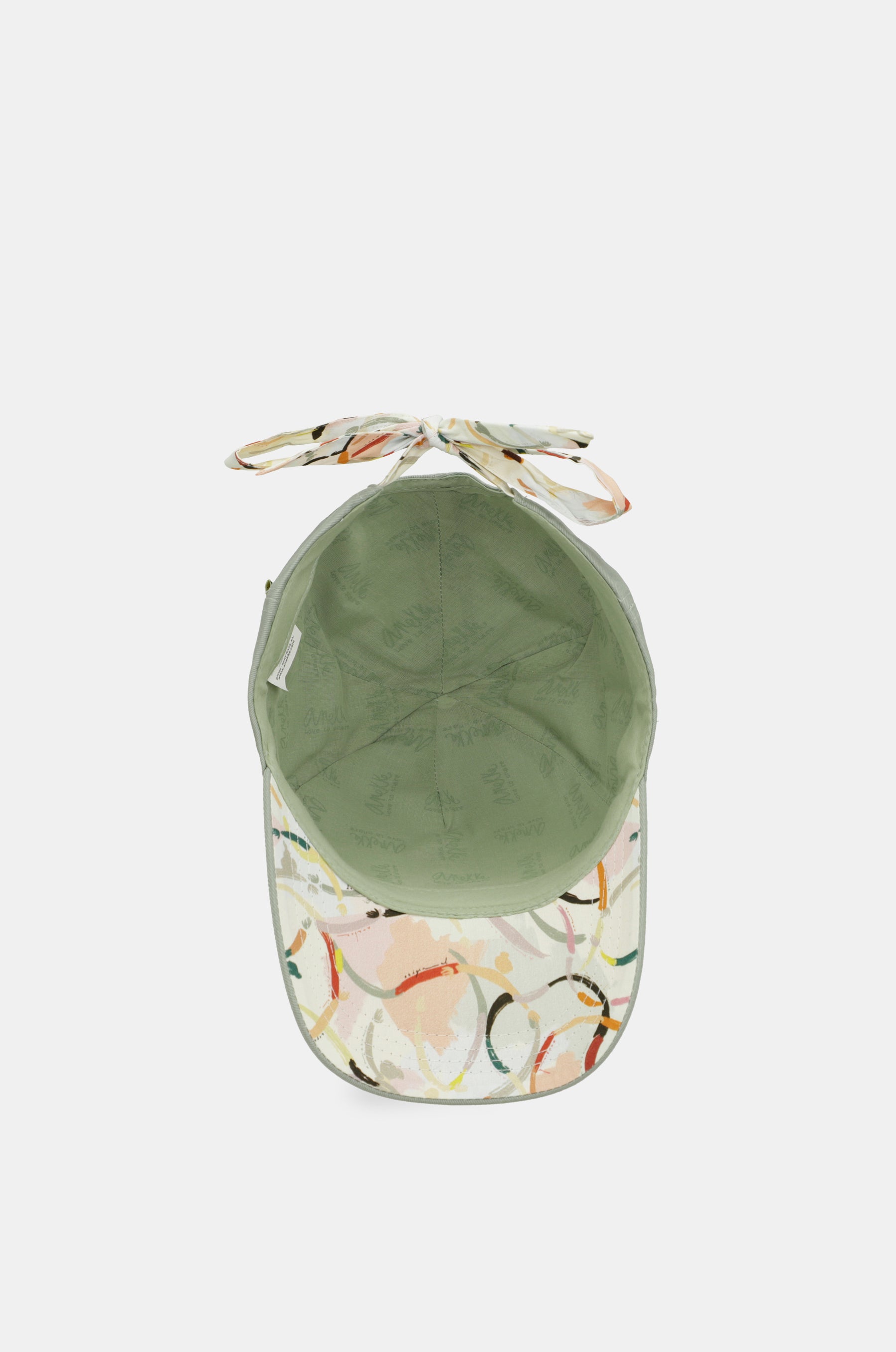 Green cap with printed bow