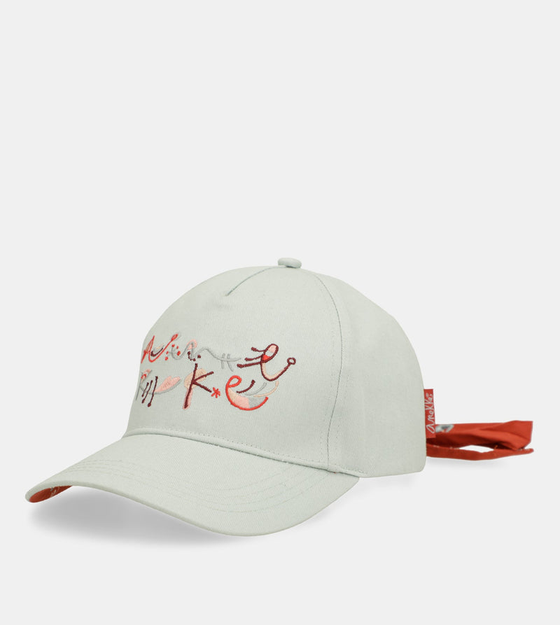 Green cap with red bow