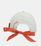 Green cap with red bow