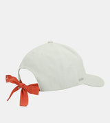 Green cap with red bow