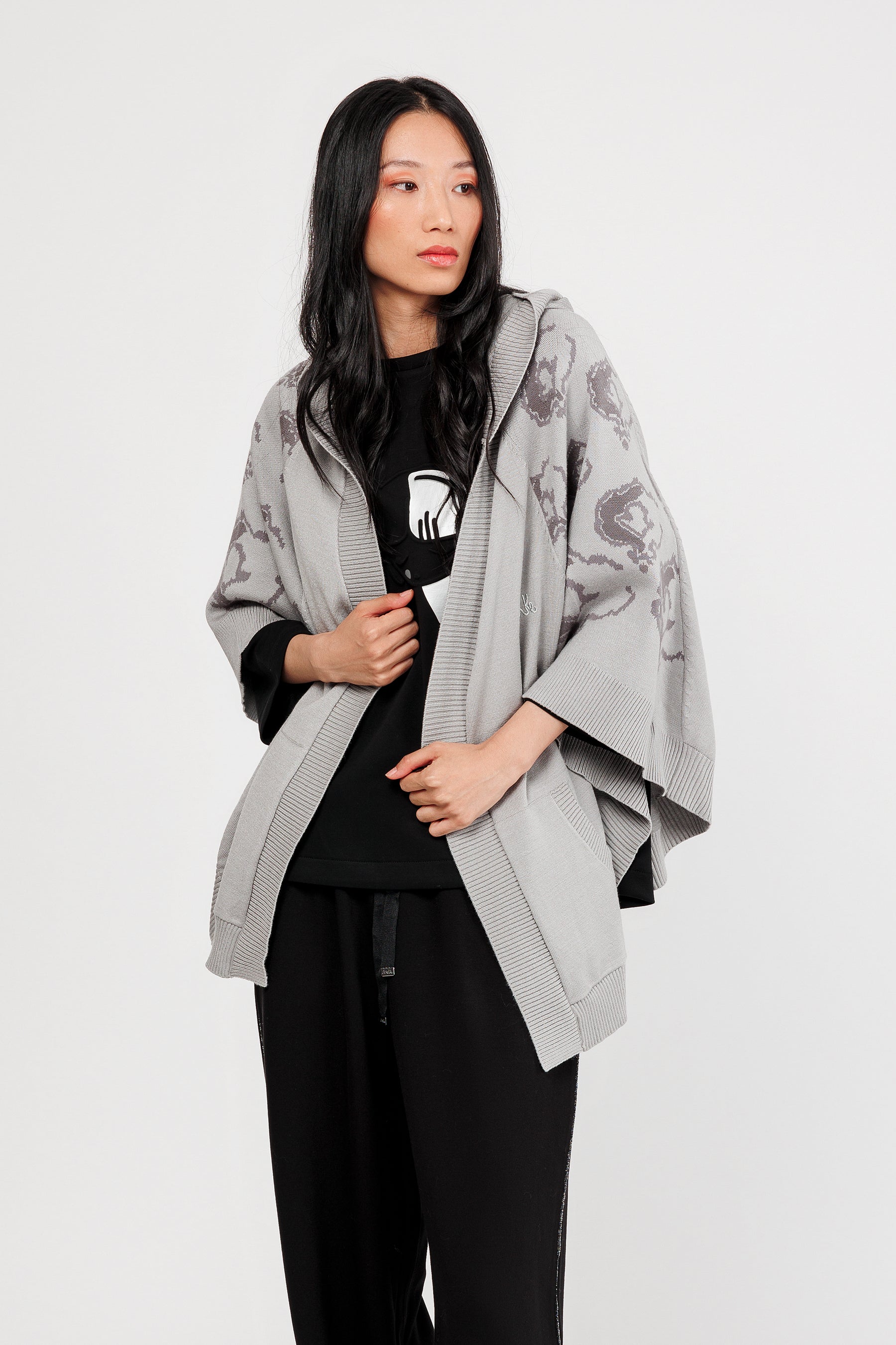 Grey poncho-style jacket