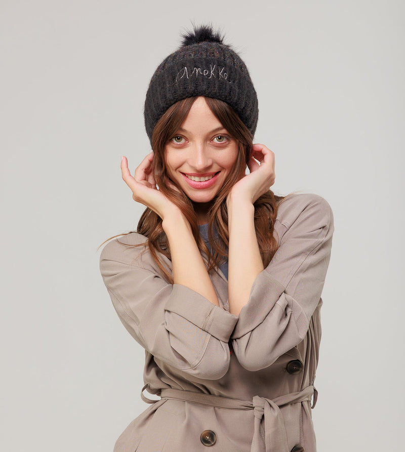 Black knitted beanie with pompom