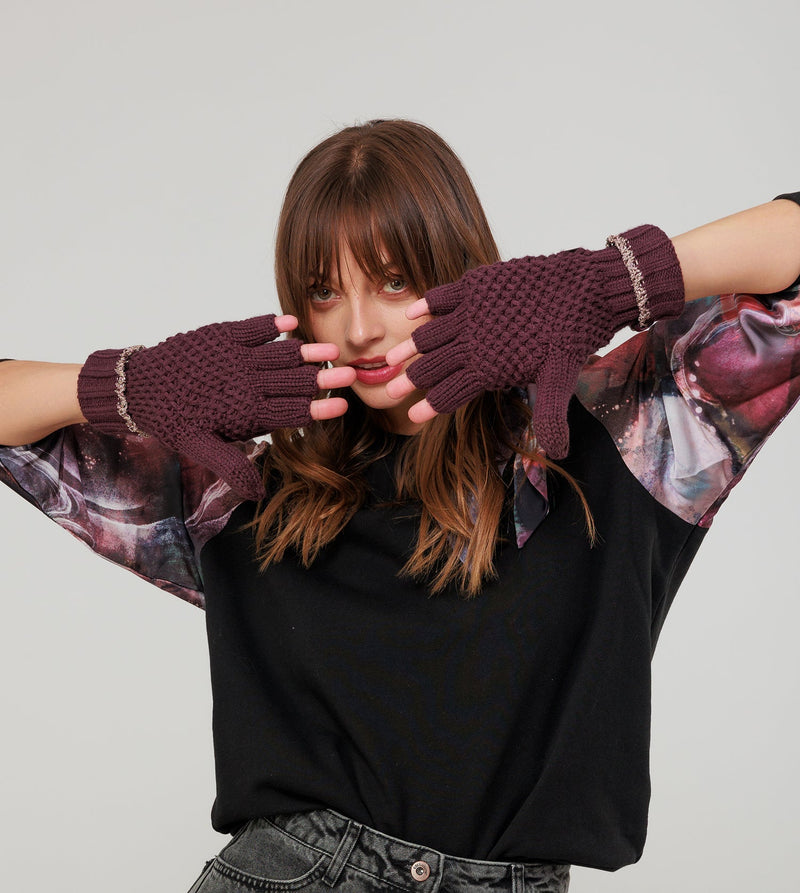 Purple knitted mittens