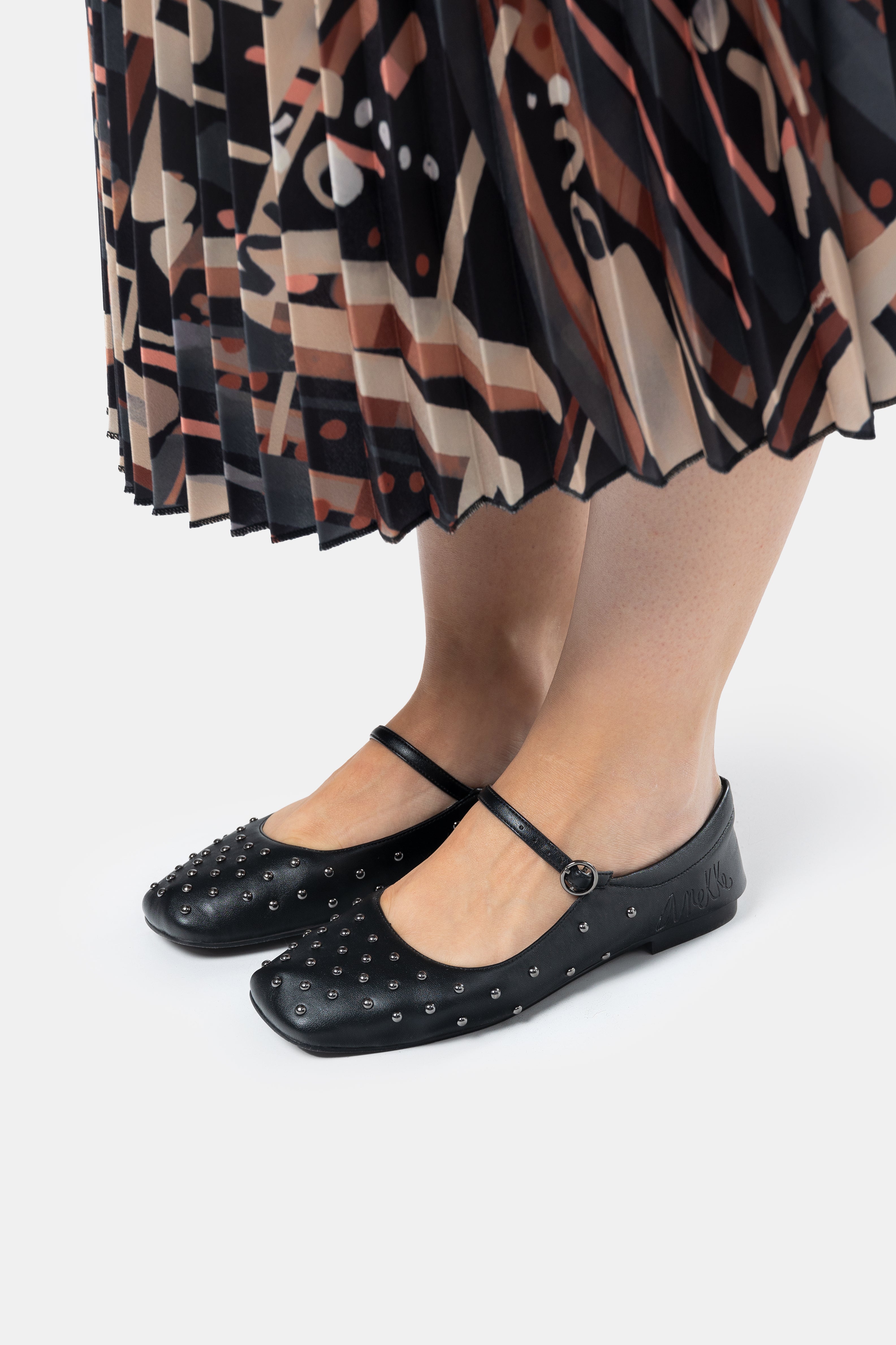 Black studded ballerinas
