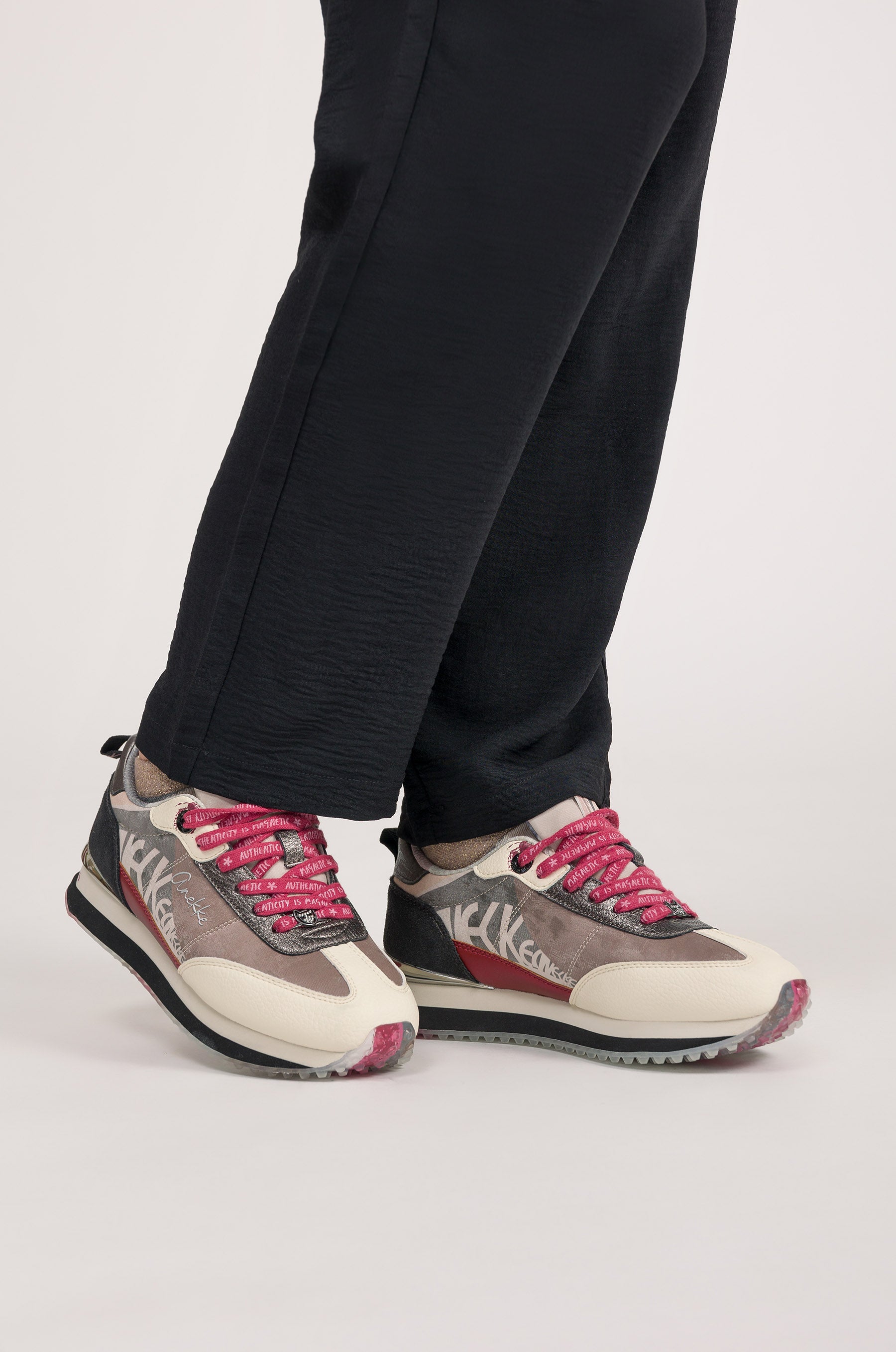 Pink and white sneakers